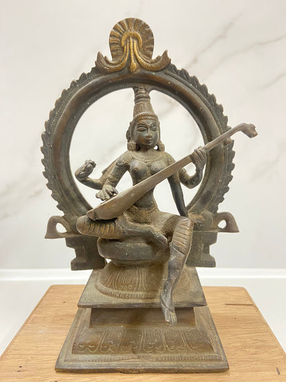 Old Bronze Seated Goddess Saraswati Playing Veena or Sitaar