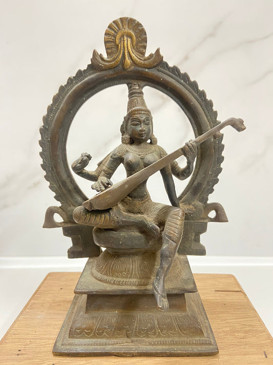 Old Bronze Seated Goddess Saraswati Playing Veena or Sitaar
