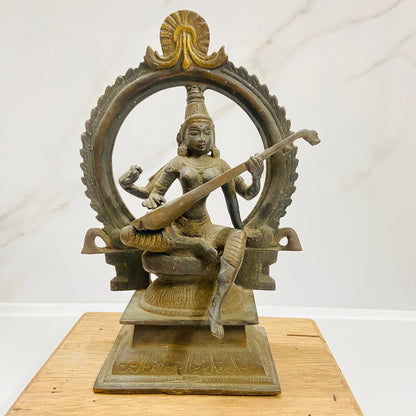 Old Bronze Seated Goddess Saraswati Playing Veena or Sitaar