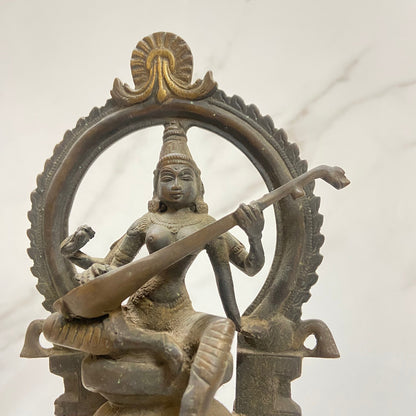Old Bronze Seated Goddess Saraswati Playing Veena or Sitaar